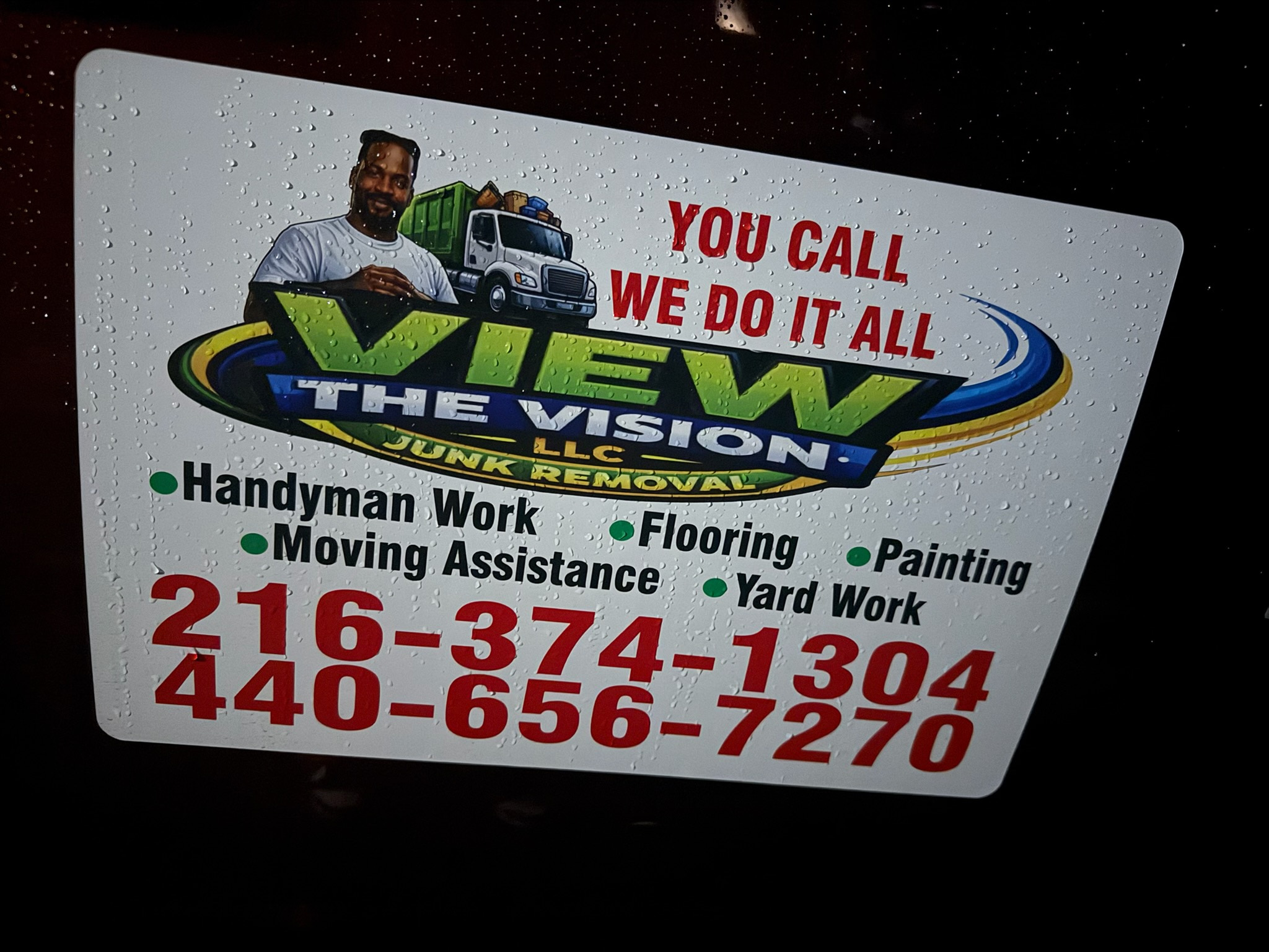 View the Vision LLC junk removal sign card listing services and both phone numbers
